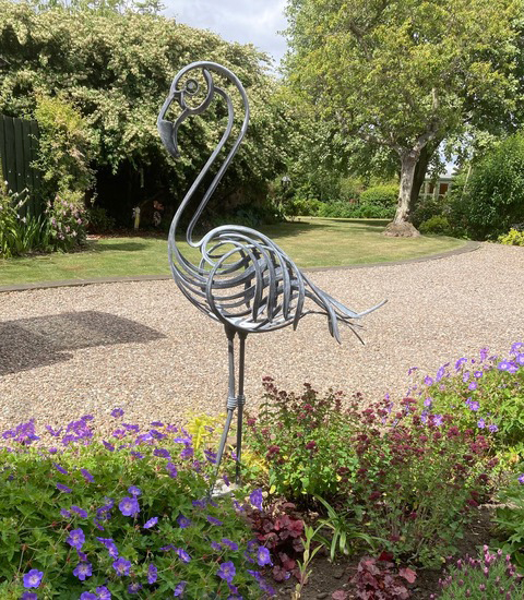 Forged Flamingo, created from mild steel, galvanised and acid etched