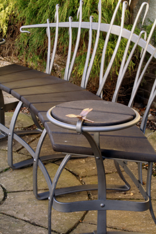 Curved patio bench dragon fly & table detail
