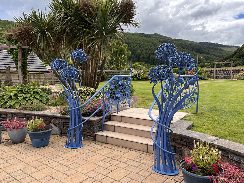 Agapanthus sculptural posts created from mils steel, galvanised and painted blue.