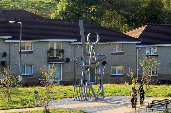 Backshift, 14 metre tall sculpture in Stanes Park, Shotts. The site of the former Shotts Iron Works, the sculpture represents the foundry tools stacked up awaiting the next shift of men arriving to work in the foundry.